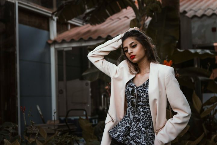 Irish Brands - woman in white blazer standing and smiling