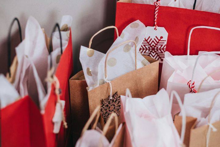 Sustainable Gifts - shallow focus photography of paper bags