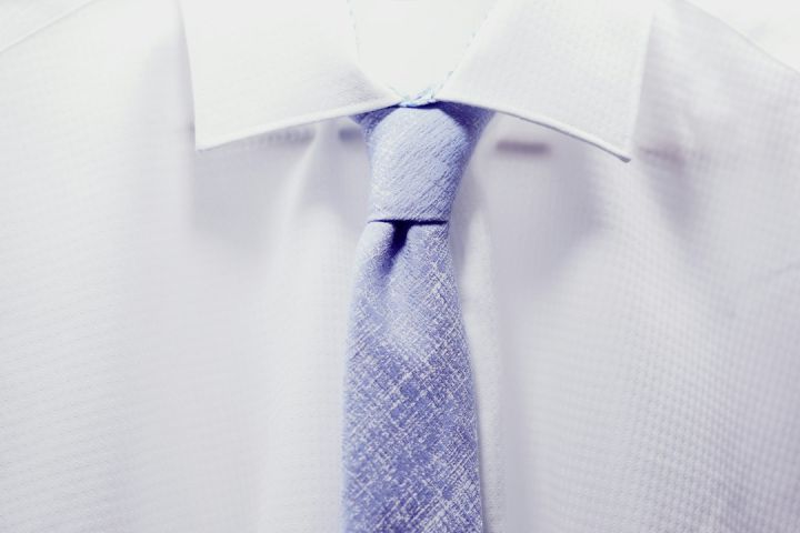 Classic White Shirt - close up photo white collared shirt with blue necktie