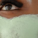 Beauty Essentials - Anonymous black woman with clay mask