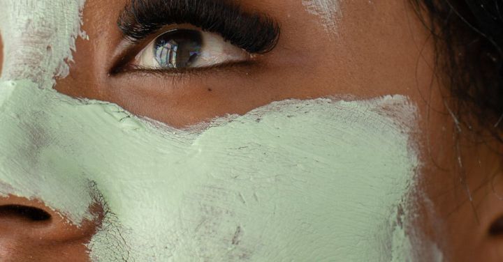 Beauty Essentials - Anonymous black woman with clay mask