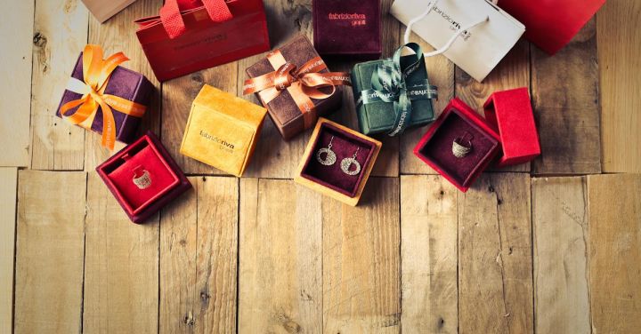 Shopping - Assorted Gift Boxes on Brown Wooden Floor Surface