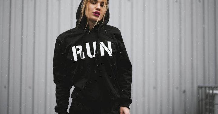 Sportswear - Woman Wearing Black and White Run-printed Pullover Hoodie